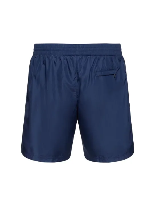 Dolce&amp;Gabbana   Solid color swim shorts w/ logo plaque 