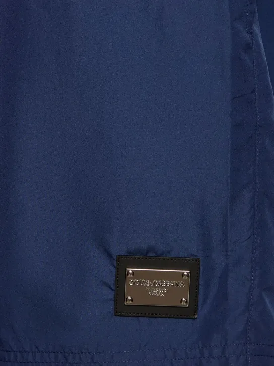 Dolce&amp;Gabbana   Solid color swim shorts w/ logo plaque 